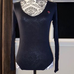 Black long sleeve rose in bordered one piece